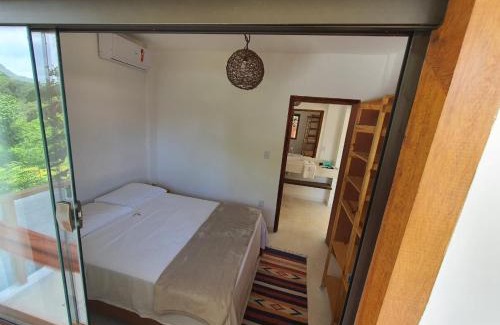 Serra Grande Apartamento | Piscina Aquecida, Jacuzzi, internet veloz, no centro de Serra Grande - Apt Verde - Vila Pitangueira