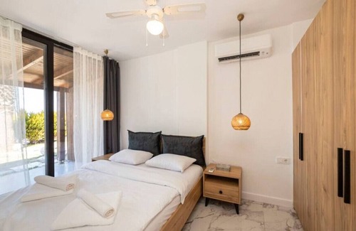 Meselik Apartamento | Pleasant Home with Shared Pool in Bodrum