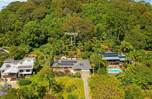 Ocean Shores Cabaña | Poinciana - Fabulous coastal home with lush gardens & panoramic views