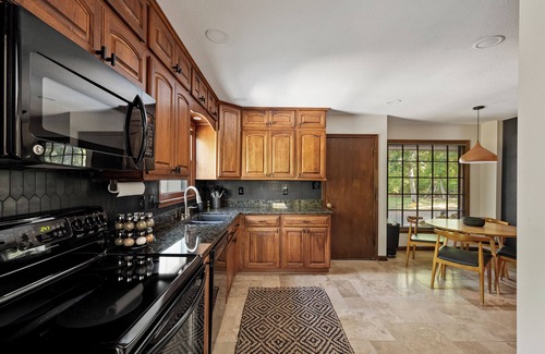 Merriam Casa | Pool & Hot Tub in the heart of KC! Tons of stylish space inside and out!
