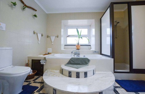 Ribeira Grande Casa | Pool suite with marble bath in exotic fruit orchard