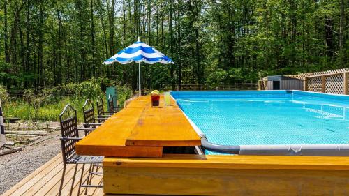 New Paltz Casa | PoolHot Tub Firepit Near Hikes Shops Dining Cragswood Lodge by AvantStay