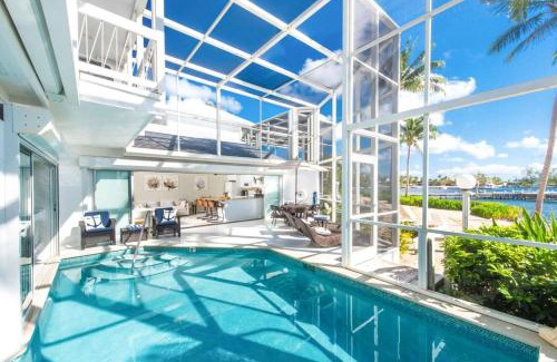 Rum Point Casa | Pools of the Kai 6 - Beachfront Condo with Private Pool Atrium, Modern Kitchen, and Outdoor Grill