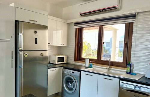 Esentepe Apartamento | Poolside 2 Bedroom Vacation Rental With Garden Terrace