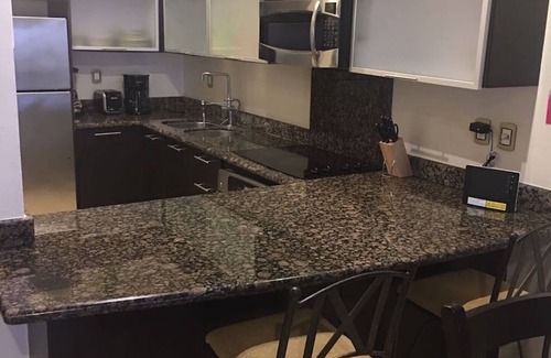 Downtown Condominio | Hermoso condominio de 2 dormitorios justo en la playa en Playa del Carmen !! (102 arrecifes)