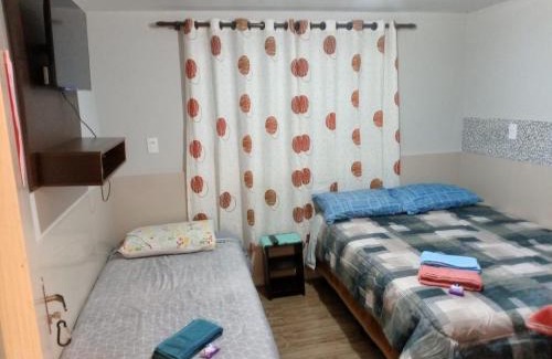 Lages Casa | POUSADA ALTERNATIVA MANU LAGES Quarto Com Banheiro no Corredor