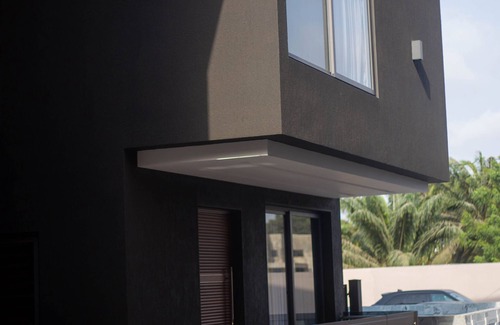 East Legon Apartamento | Apartamento Premium en Accra con vistas a la ciudad y terraza en la azotea