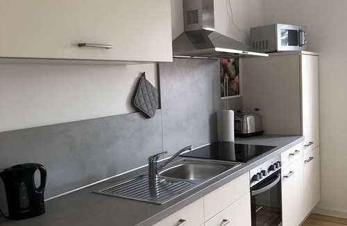 Beuel-Mitte Apartamento | Premium living - central Apartamento en la planta superior para vacaciones y viajes de negocios.
