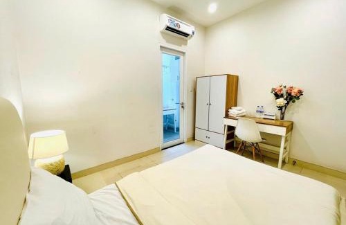 Tan Thuan Dong Apartamento | Premium Room with Balcony - Free Pick Up Airport and laundry