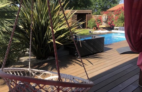 Biscarrosse Casa | Pretty wooden house with jacuzzi, air conditioning, heated pool, bicycles, internet