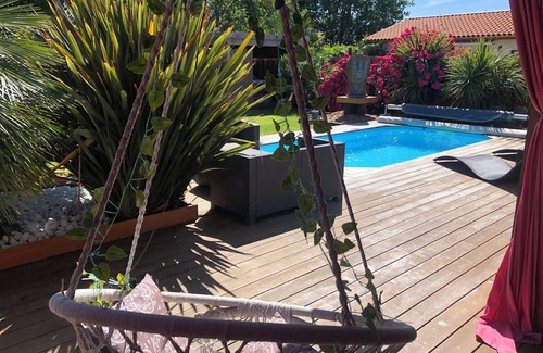 Biscarrosse Casa | Pretty wooden house with jacuzzi, air conditioning, heated pool, bicycles, internet
