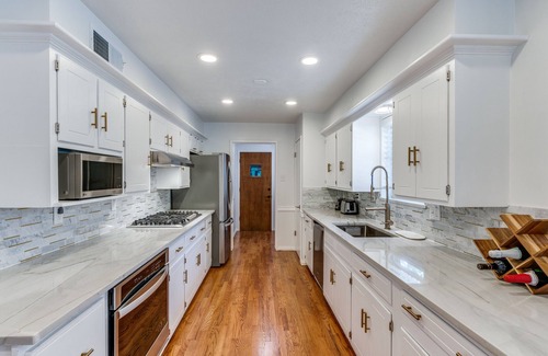 Lakewood Casa | Prime location chic 4BR home with charming pool and yard