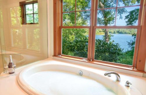 Orleans Casa | Pristine waterfront oasis plus game room jacuzzi and home office