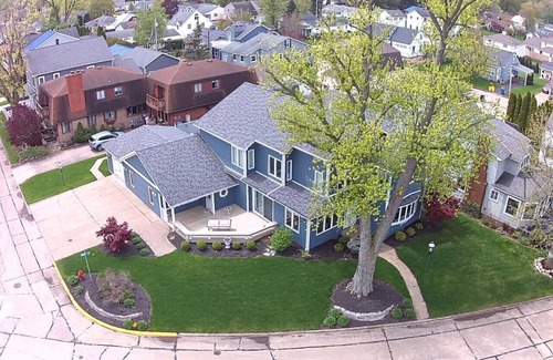 Huron Casa | Private heated pool in back & Sandy beach in front