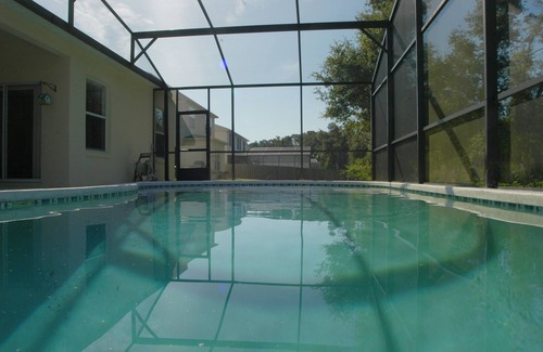 Crescent Lakes Casa | Casa privada cerca de Disney con piscina y vista de la conservación