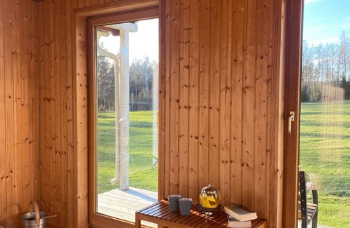 Ramkvilla Cabaña | Private lake access + pier Garden sauna Secluded location Natural grounds Fireplace bedroom