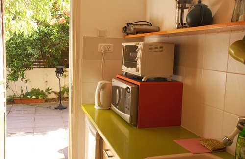 Herzliya Apartamento | Para vacaciones o viajes, unidad de 2 habitaciones y hermoso jardín de 40 metros cuadrados.