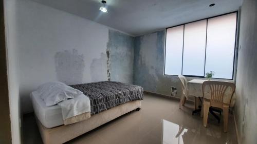 Callao Casa | PRIVATE ROOM I 13 minutes from the Airport With Kitchen Access Apartment under renovation
