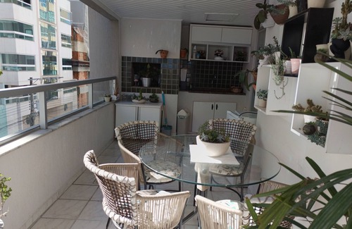 Itapema Apartamento | Private room with air conditioning, TV, minibar. In a beautiful apartment, 250m from the beach. shared