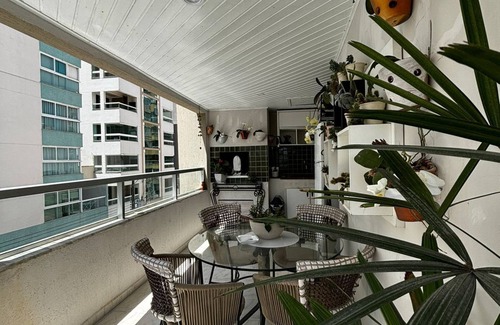 Itapema Apartamento | Private room with air conditioning, TV, minibar. In a beautiful apartment, 250m from the beach. shared