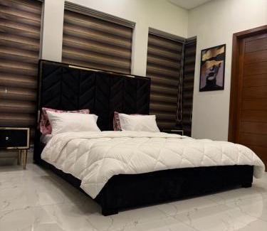Lahore Casa | Private Suite Air Conditioner with Living Area Kitchen and Garage