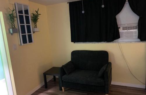 Pinellas Park Casa | Private suite with small kitchen private bathroom entrance porch and driveway