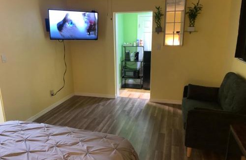 Pinellas Park Casa | Private suite with small kitchen private bathroom entrance porch and driveway