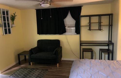 Pinellas Park Casa | Private suite with small kitchen private bathroom entrance porch and driveway
