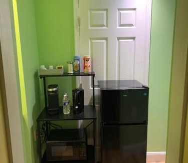 Pinellas Park Casa | Private suite with small kitchen private bathroom entrance porch and driveway