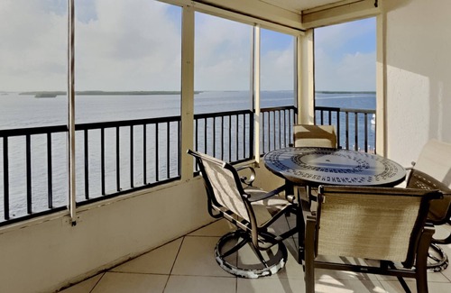 Punta Rassa Condominio | Punta Rassa #404 TRANQUIL SPACIOUS 2 BED CONDO WITH GORGEOUS SUNSET WATER VIEWS