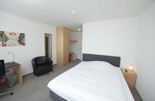 Belp Hotel | QCM Campus