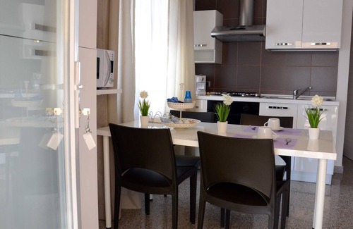 Matera Apartamento | Cuádruple-Familiar-Baño con ducha-Vista al Jardín