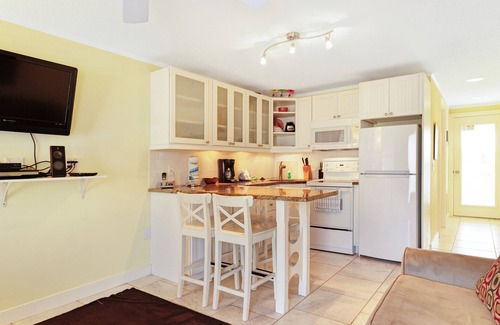 Holmes Beach Villa | Pintoresco dúplex frente a la playa en una ubicación ideal - lanai filtrada y carrito gratis!