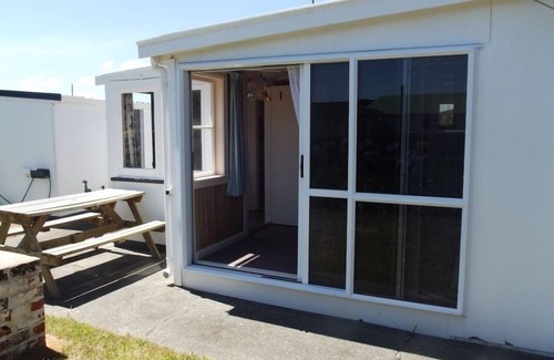 Foxton Beach Casa | Pintoresco cómodo conveniente bien equipado bach
