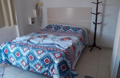 Sao Bento do Sapucai Apartamento | Quarto Aconchegante