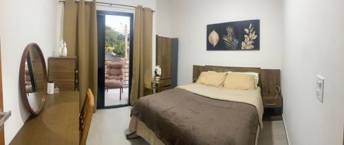 Jaguariuna Cama Y Desayuno | Quarto com Varanda e Vista para a Mata