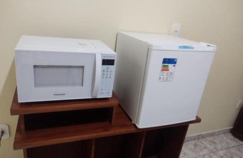 Holambra Casa | QUARTO CONFORTAVEL COM GARAGEM