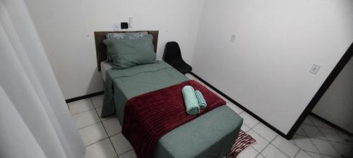Costa e Silva Casa | Quarto em casa de família