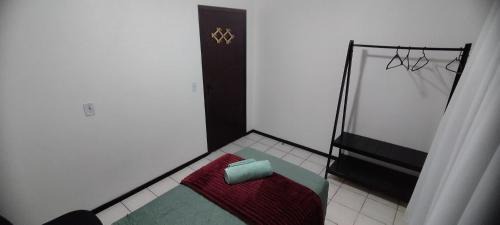 Costa e Silva Casa | Quarto em casa de família