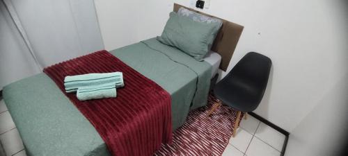 Costa e Silva Casa | Quarto em casa de família