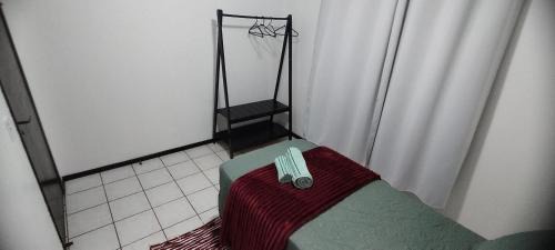 Costa e Silva Casa | Quarto em casa de família