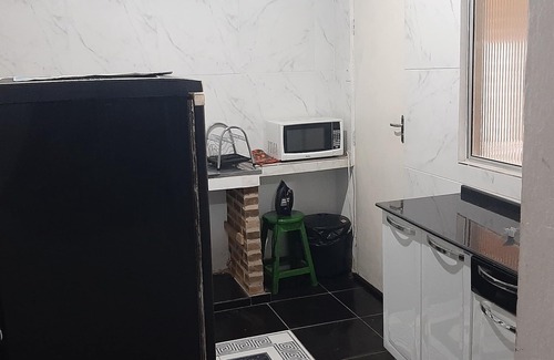 Gavea Casa | Quarto Suite e Cozinha na Gavea