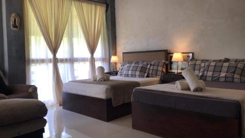 San Benito Cama Y Desayuno | Querencia Siargao