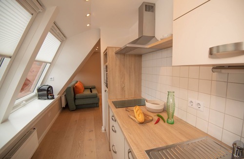 Norderney Apartamento | Tranquilidad y relajación en las casas de arco del asentamiento del casco norte.