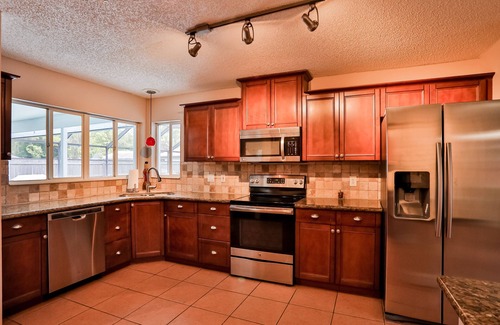 Palm Coast Casa | Quiet home with enclosed yard, heated pool with jets, & screened lanai