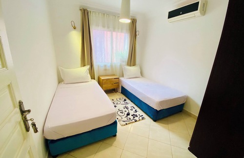 Mouassine Apartamento | Quiet modern apartment in Guéliz with parking and wifi