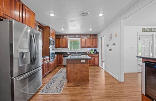 River Bend Casa | Quiet Riverfront 3BR/2BA house with Spa, Dock, and Golf Carts