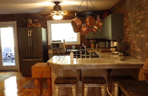 Parkland County Casa | Quiet , secluded , 5 acres outdoor fireplace , indoor wood stove , hot tub