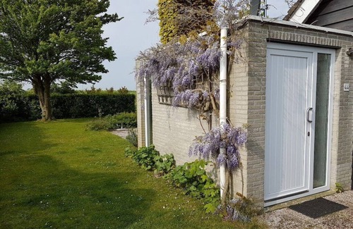 Bruinisse Casa | Casa de vacaciones en una zona tranquila de Zelanda
