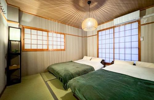 Shin-Osaka Villa | R 新大阪 FUJI サウナ付きの5LDK 3つのお風呂でグループで楽しめます。